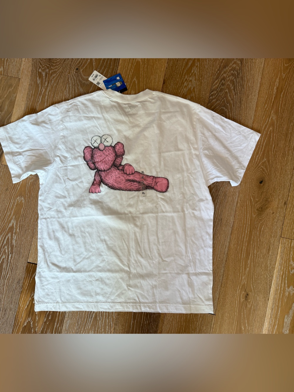 KAWS × Uniqlo UT Short Sleeve Graphic
T-shirt Size XL Pink BFF new - Picture 11 of 12